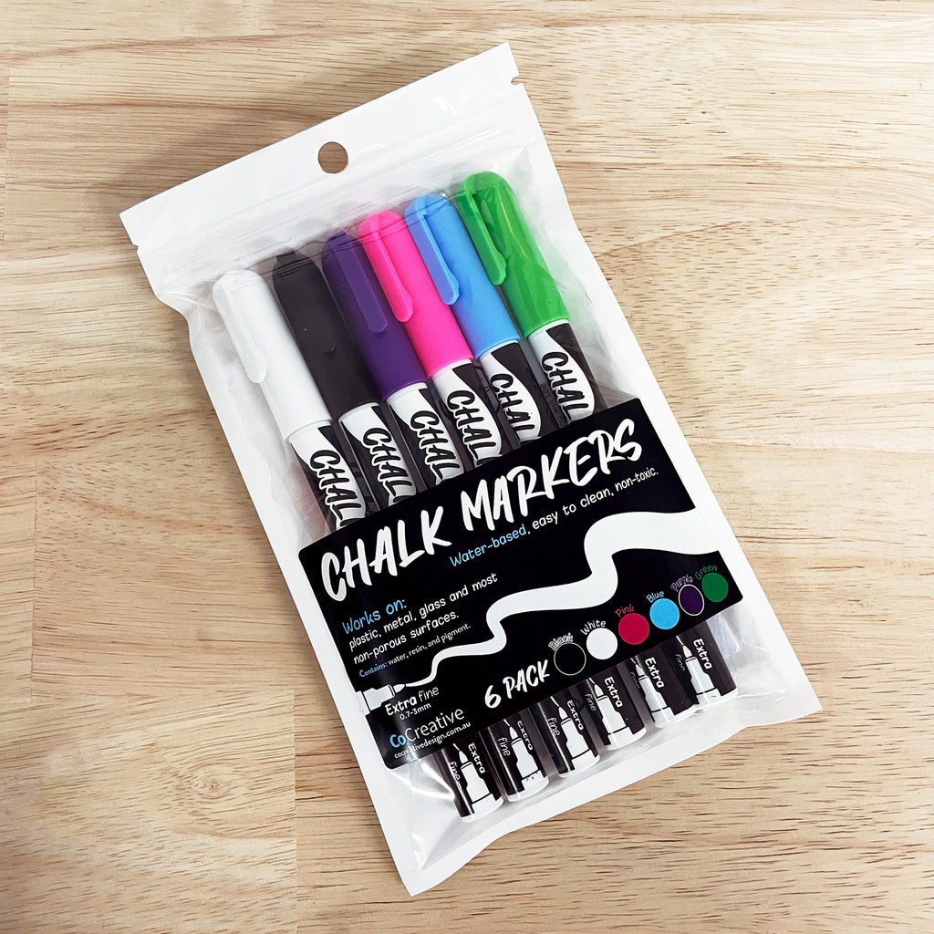 coloured chalk pens in 6 colours. chalk markers in white, black, pink, blue, green and purple. extra-fine liquid chalk markers 0.7 - 3mm lines. non-toxic and water-based chalk markers perfect for little kids to use.