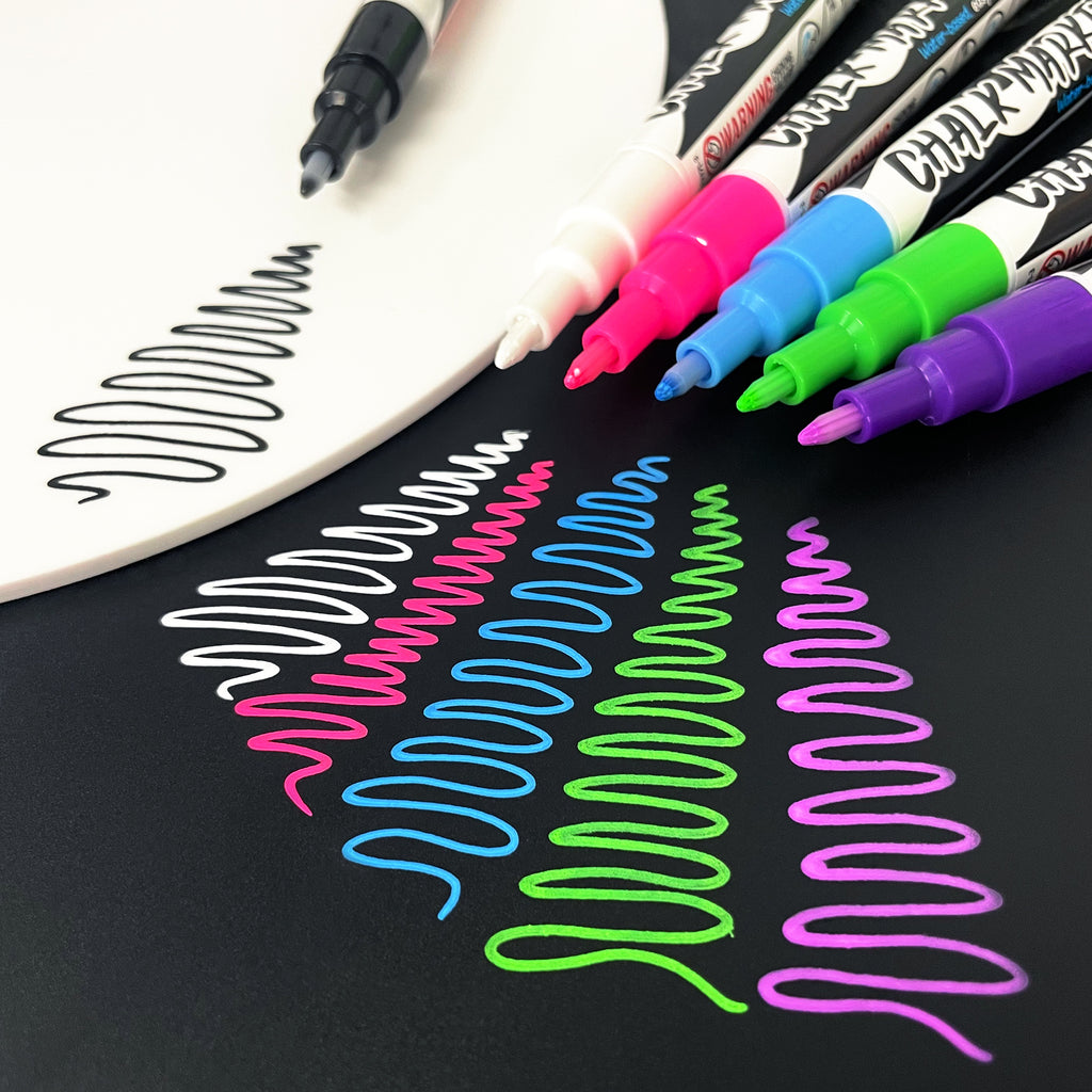 coloured chalk pens in 6 colours. chalk markers in white, black, pink, blue, green and purple. extra-fine liquid chalk markers 0.7 - 3mm lines. beautiful vivid colours, great ink opacity and consistent ink flow.
