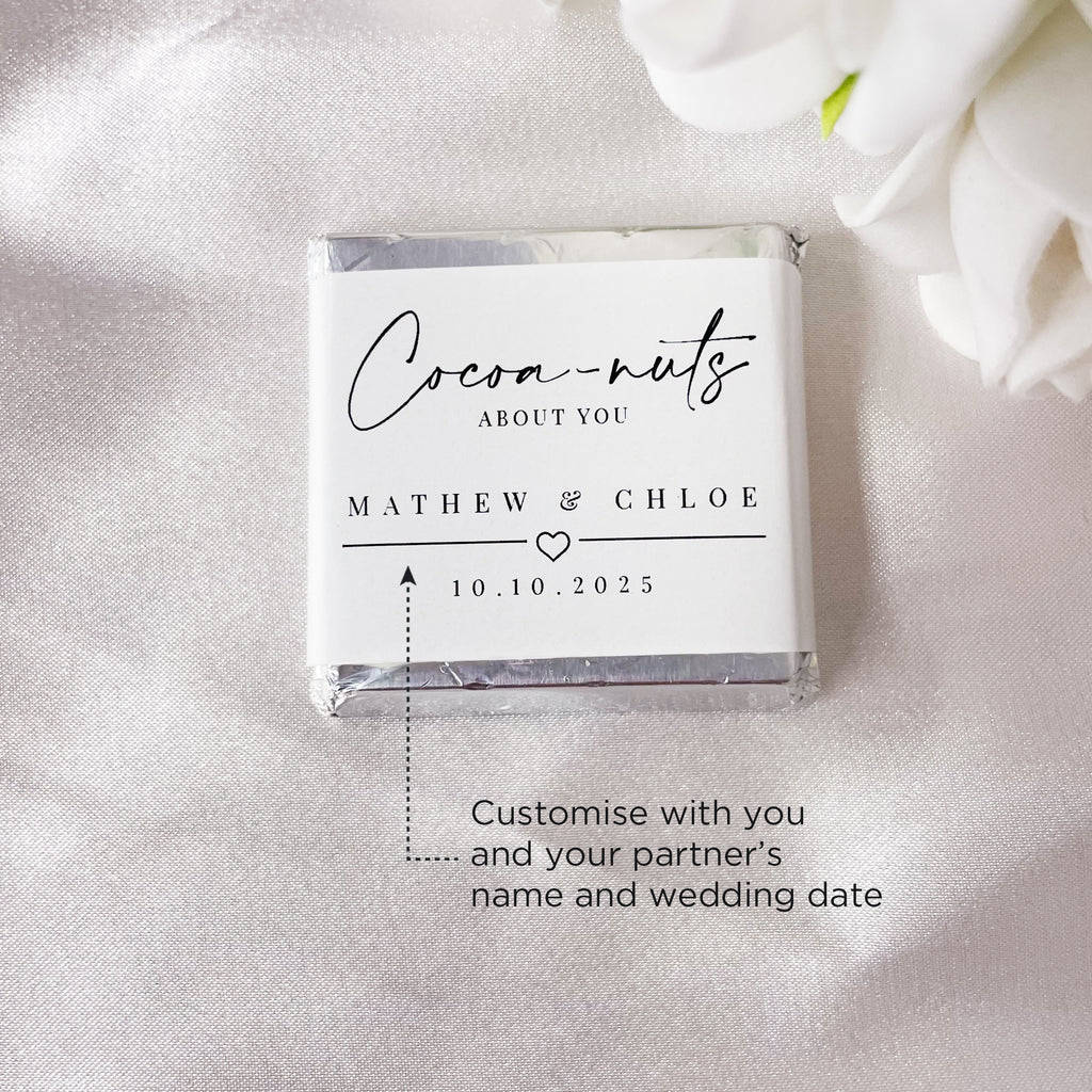 "Cocoa-nuts about you" minimalist wedding chocolates. Cute wedding favour ideas. Mini chocolate squares personalised with your names and date. 