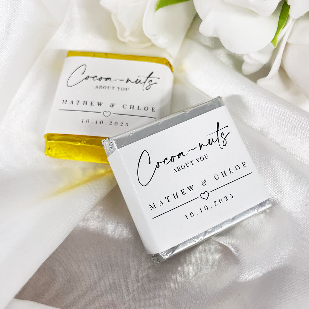 "Cocoa-nuts about you" minimalist wedding chocolates. Cute wedding favour ideas. Mini chocolate squares personalised with your names and date. 