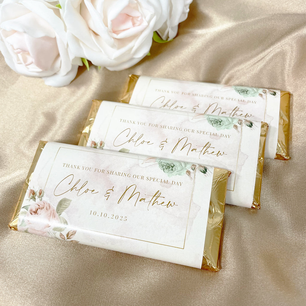 Gold floral wedding chocolate bars with custom name, date and message. Elegant gold foil wrapped chocolate bars with custom wrapper. Wedding favour chocolate bars, Cadbury chocolate. 