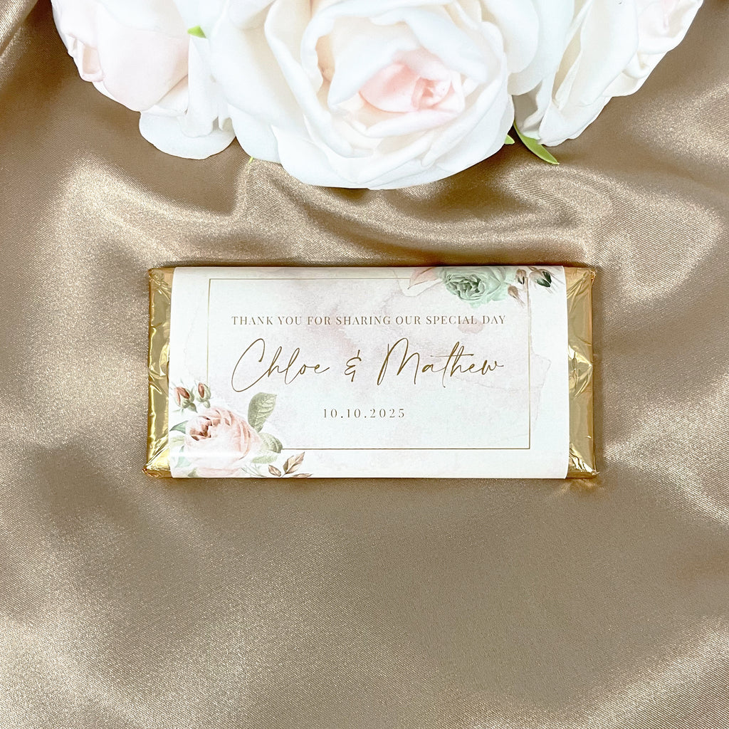 Gold floral wedding chocolate bars with custom name, date and message. Elegant gold foil wrapped chocolate bars with custom wrapper. Wedding favour chocolate bars, Cadbury chocolate. 