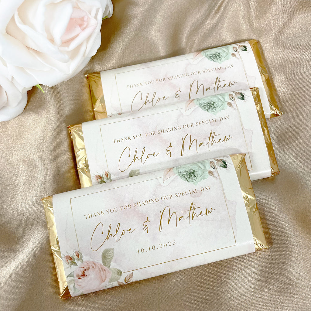 Gold floral wedding chocolate bars with custom name, date and message. Elegant gold foil wrapped chocolate bars with custom wrapper. Wedding favour chocolate bars, Cadbury chocolate. 