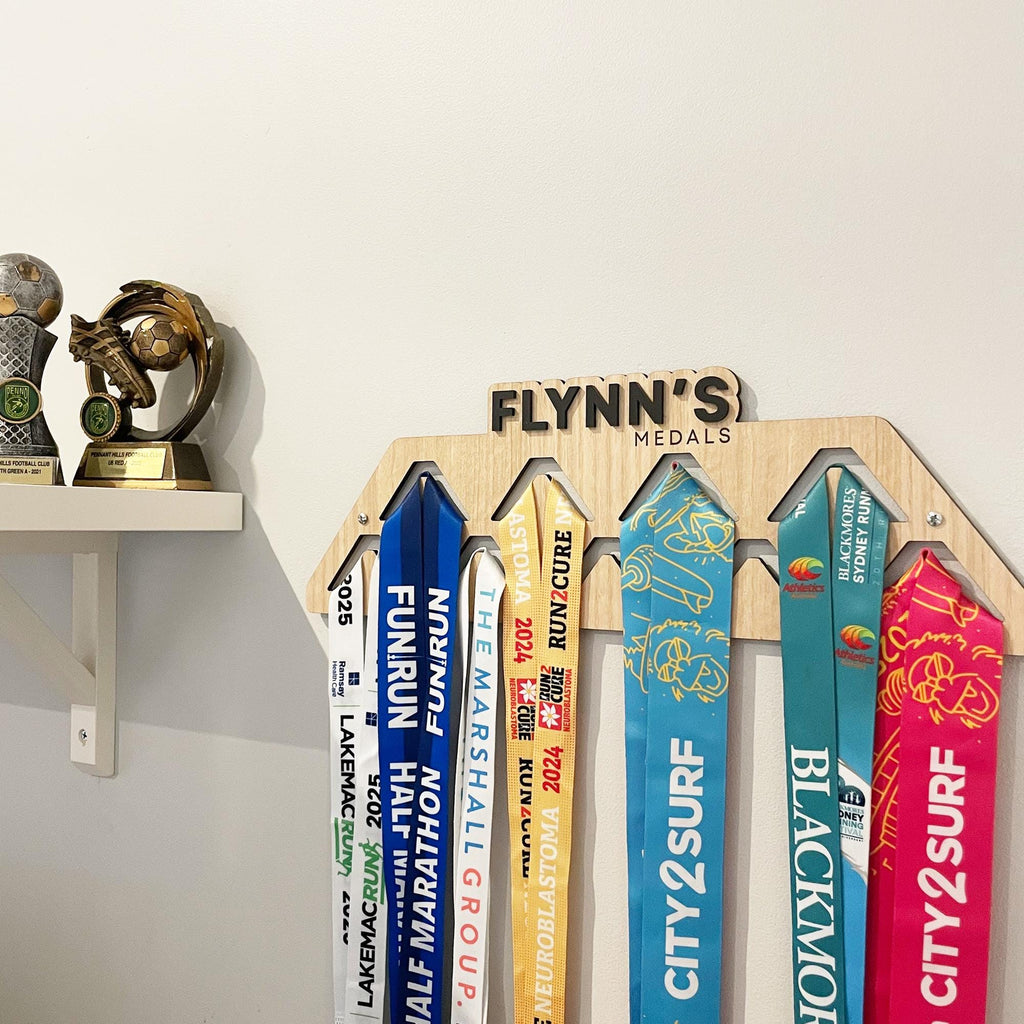 Custom sporting medal display. Personalised name sports medal display hanger, wall-mounted. Perfect gift for athletes and runners. Display next to your trophies and medals to celebrate your sporting achievements.