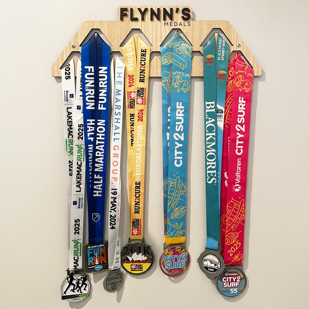 Custom sporting medal display. Personalised name sports medal display hanger, wall-mounted. Display up to 45 medals on the wall hooks. Perfect for displaying marathon medals and running medals.