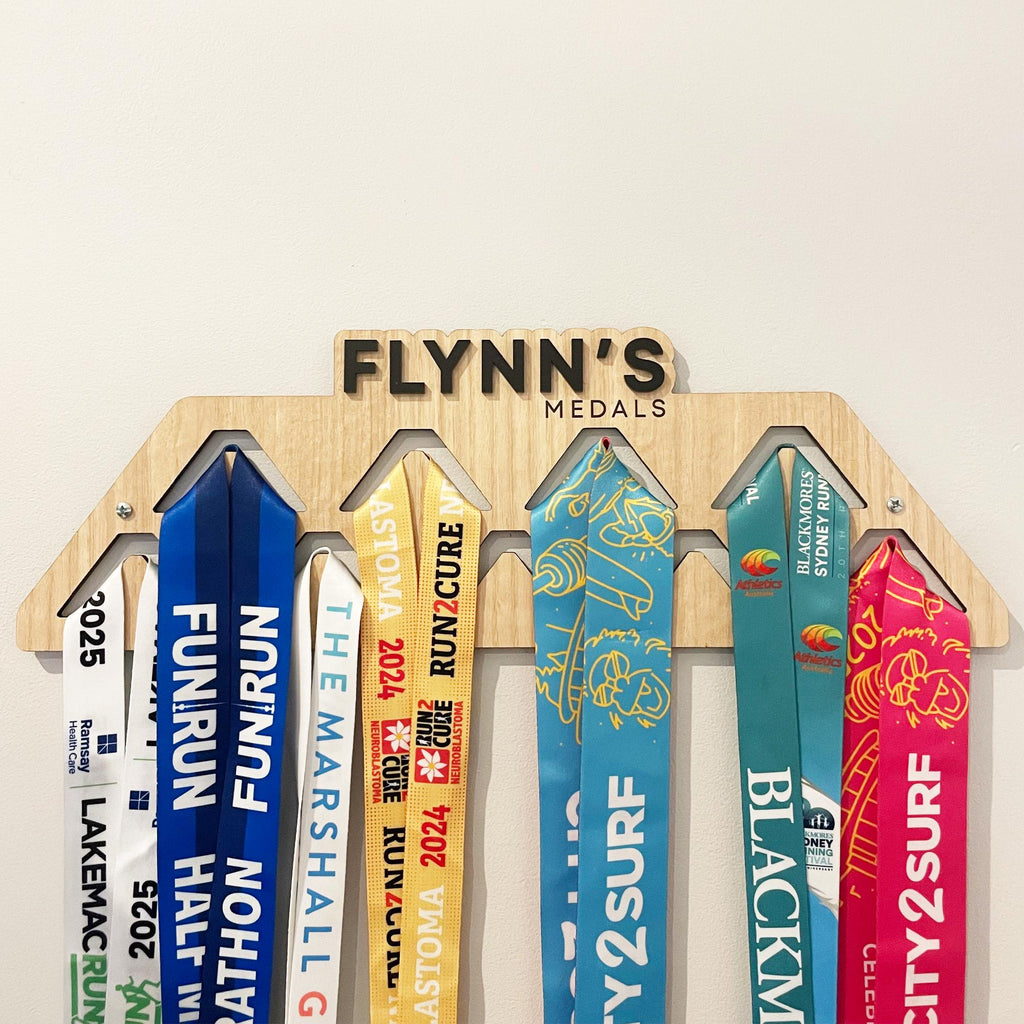 Custom sporting medal display. Personalised name sports medal display hanger, wall-mounted. Display up to 45 medals on the wall hooks.