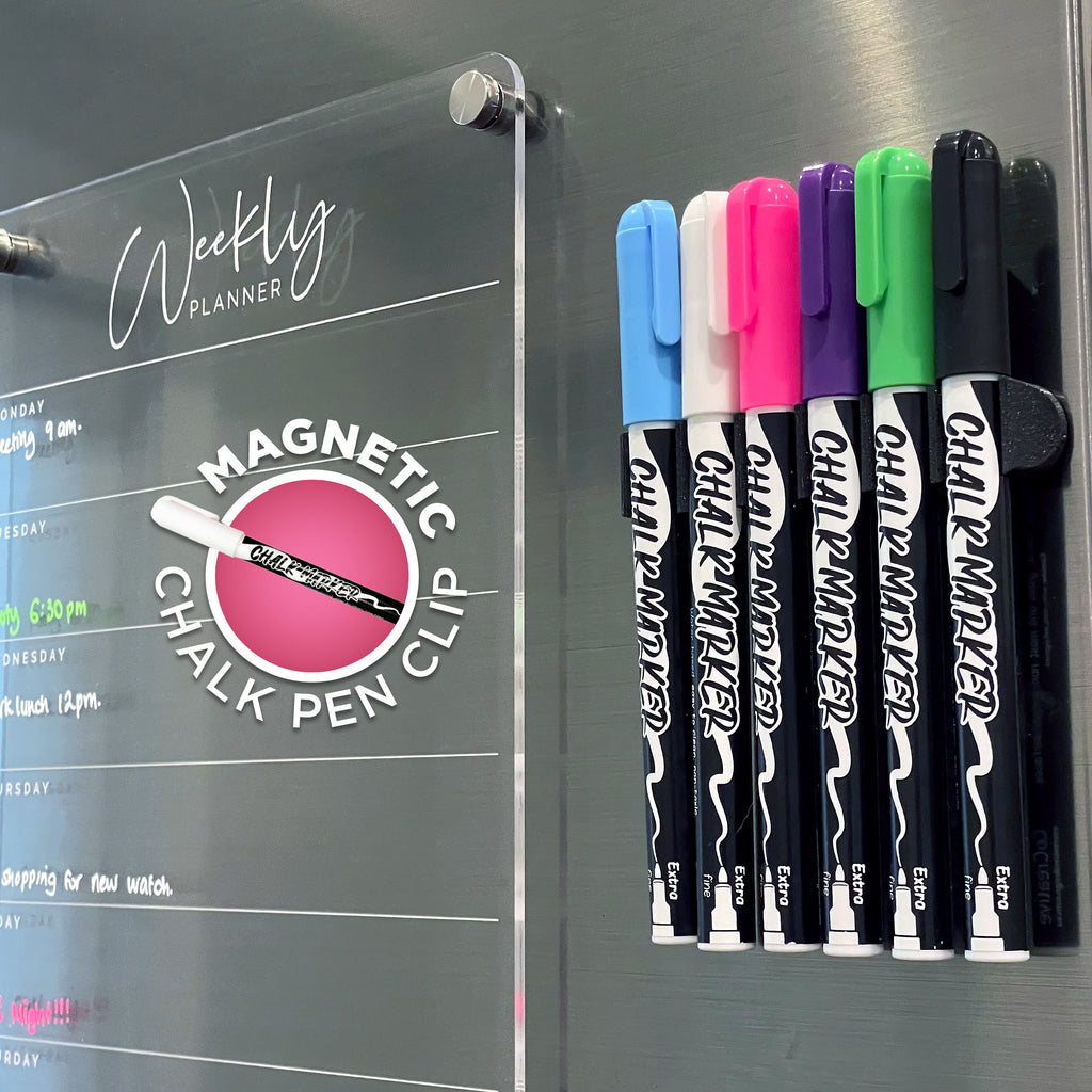 6 colour chalk markers held on a fridge with a magnetic pen holder. 3D-printed magnetic pen clip that holds 6 pens. keep your pens handy next to your planner, shopping list or to do list.
